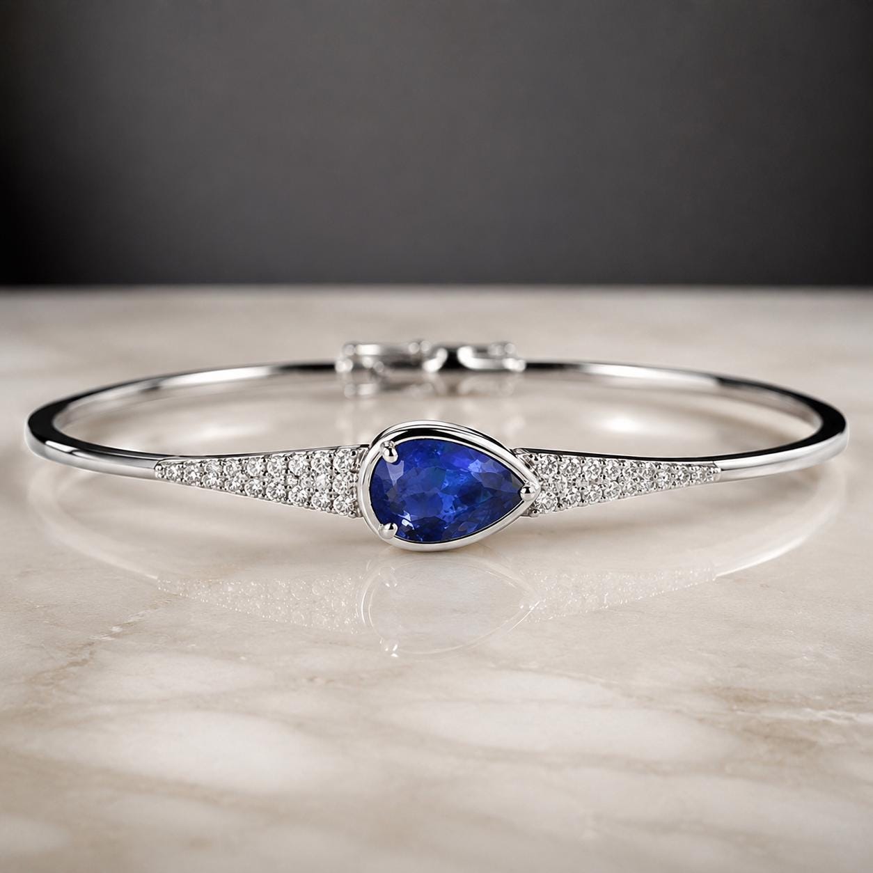 Ceylon Blue Sapphire: Vivid Blue, 0.75 crt, Non-Heated, Non-Treated, 6.76x5.09x3.24 mm, Pear Shape, From Sri Lanka, Eye Clean Stone