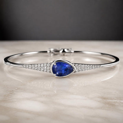 Ceylon Blue Sapphire: Vivid Blue, 0.75 crt, Non-Heated, Non-Treated, 6.76x5.09x3.24 mm, Pear Shape, From Sri Lanka, Eye Clean Stone