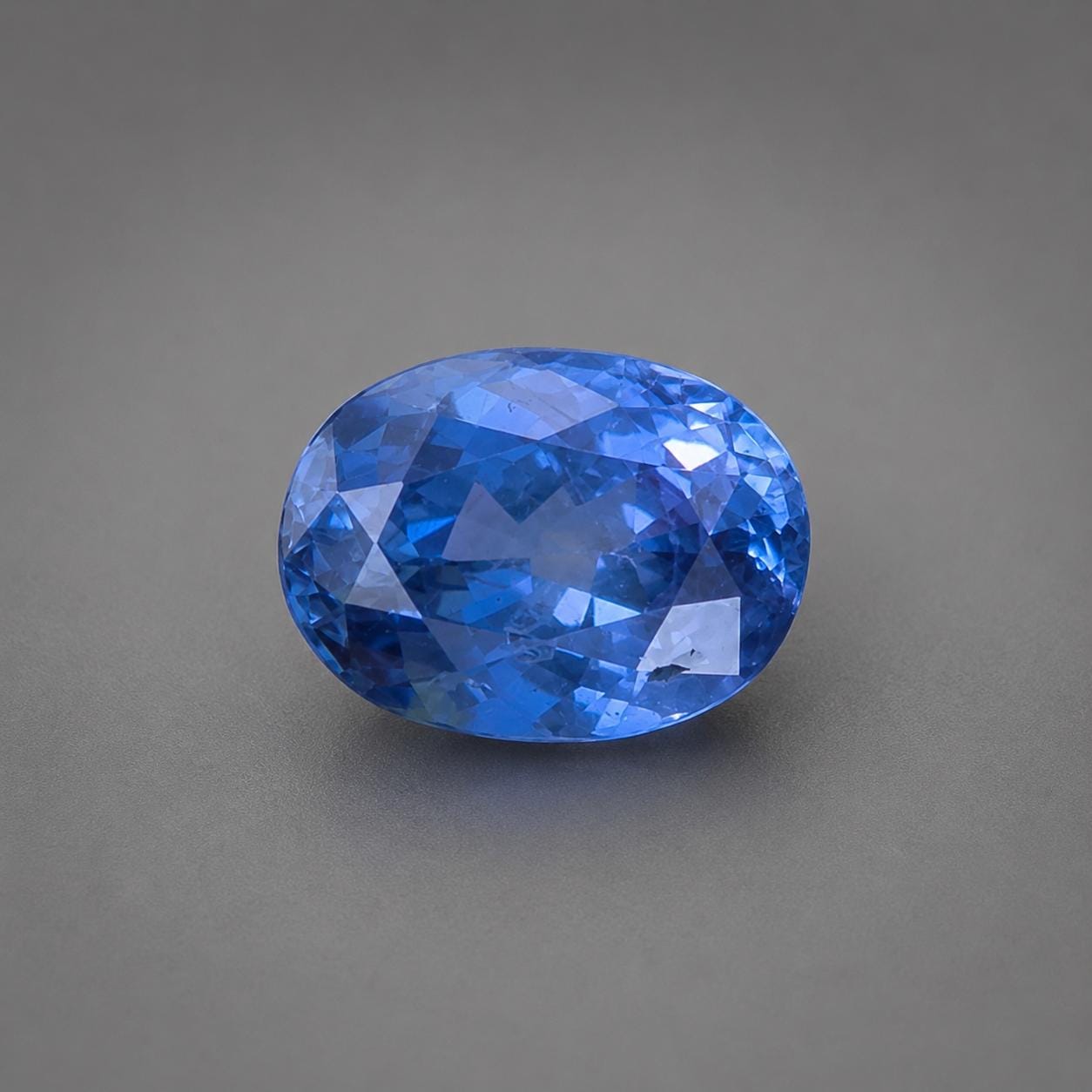 Natural Ceylon Blue Sapphire: 1.56 ct Oval Mixed Cut Gemstone From Sri Lanka