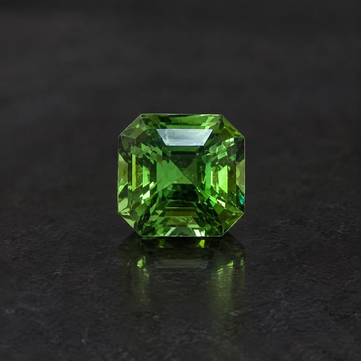 Natural Tsavorite Garnet: 2.03ct Vivid Green Step Cut (6.75x6.54x5.34mm)