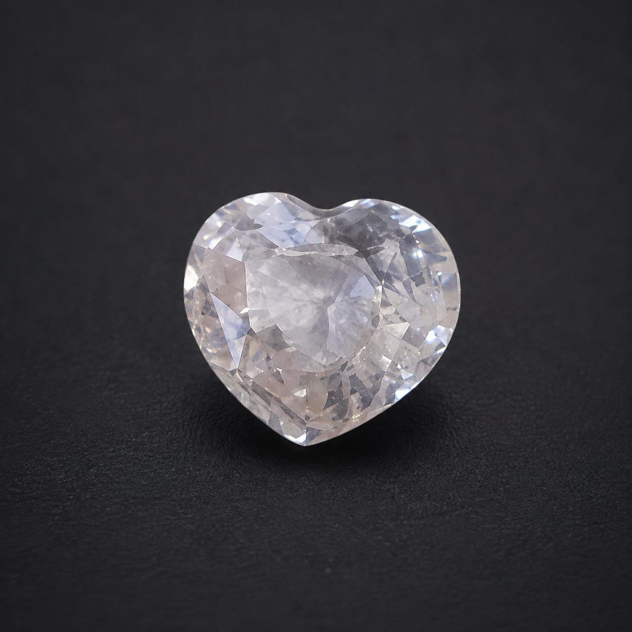 White Saphhire ( Colourless) : 1.73 crt, Non- Heated, Non-Treated, Heart Shaped Cut, 7.05x7.89x3.90 mm.