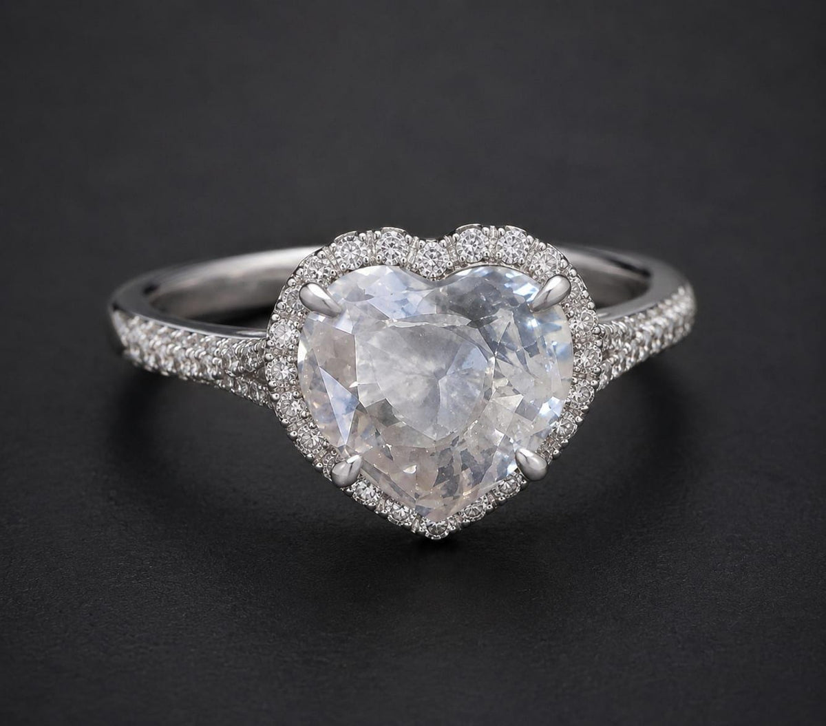 White Saphhire ( Colourless) : 1.73 crt, Non- Heated, Non-Treated, Heart Shaped Cut, 7.05x7.89x3.90 mm.