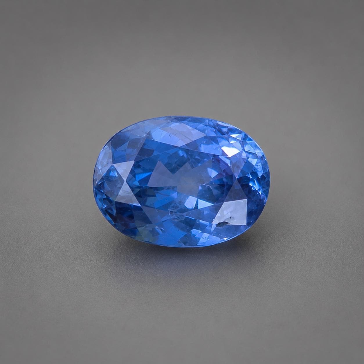 Natural Ceylon Blue Sapphire: 1.56 ct Oval Mixed Cut Gemstone From Sri Lanka