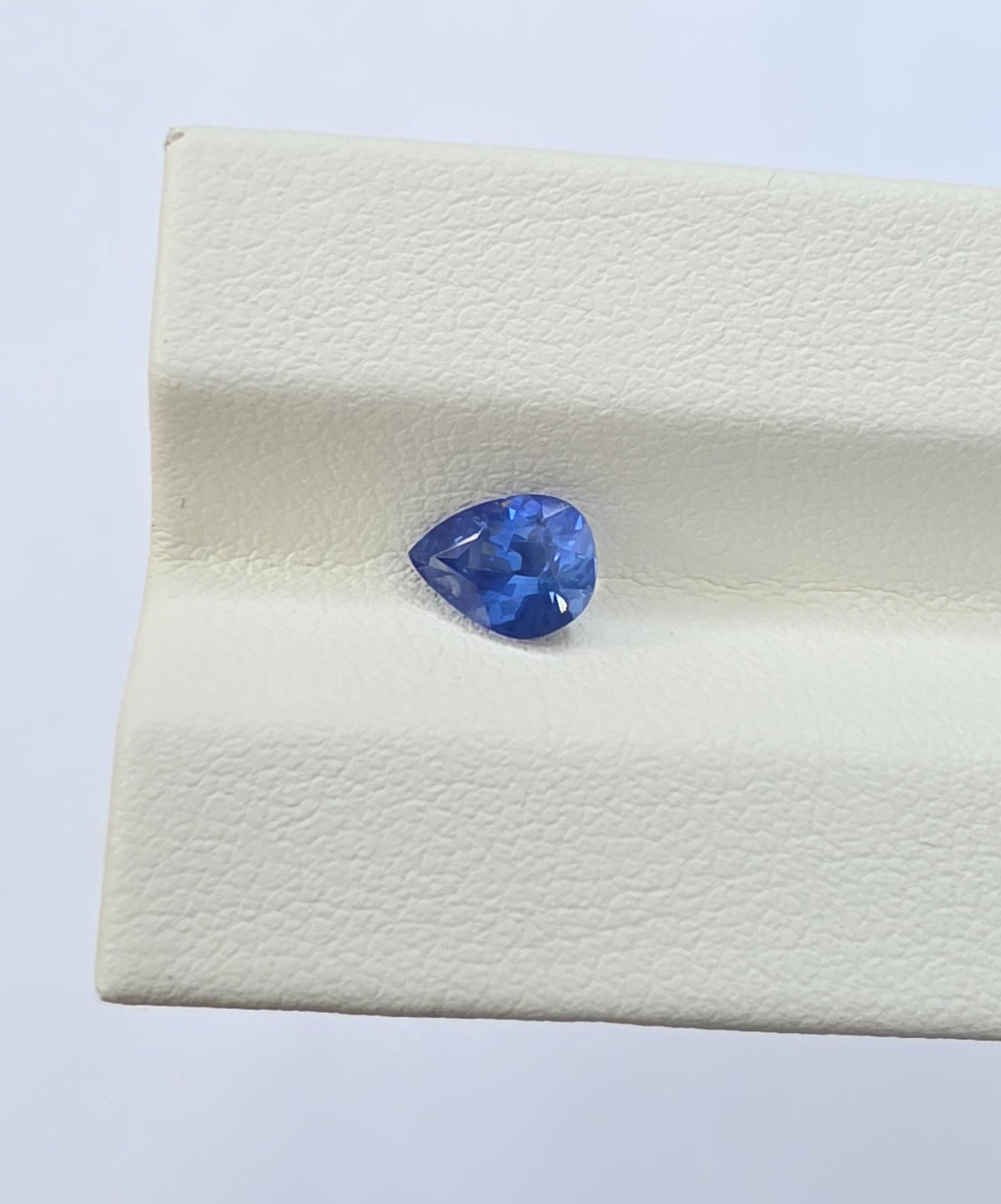 Natural Sri Lankan Blue Sapphire: Vivid Pear Shape, 0.75 Carat, Eye Clean