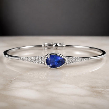 Natural Sri Lankan Blue Sapphire: Vivid Pear Shape, 0.75 Carat, Eye Clean