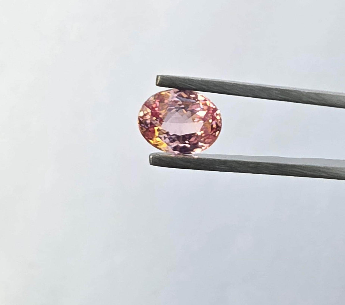 Ceylon Padparadscha Sapphire : From Sri Lanka Orangish Pink, 2.23 crt, Non-Heated, Non-Treated, Oval , 9.31 × 7.10 × 4.02 mm, Eye Clean
